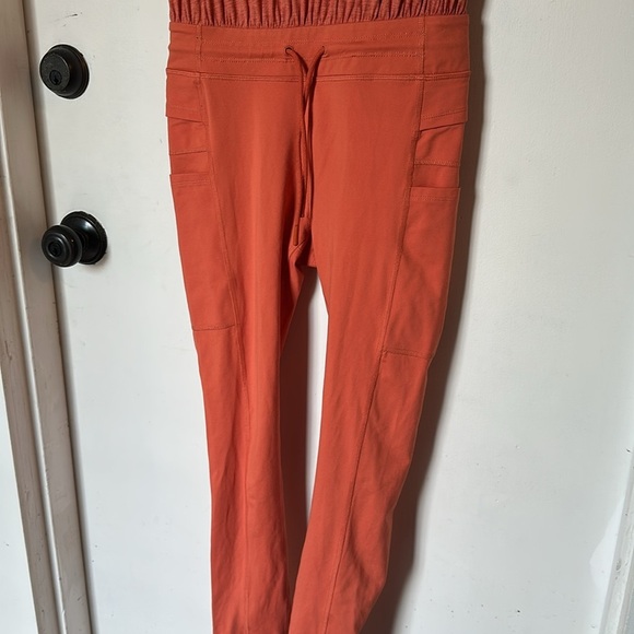 Free people MOVEMENT OFF TO THE RACES JUMPSUIT Orange xs - Picture 5 of 7